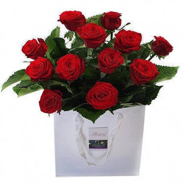 Red Roses In Craft Paper Bag